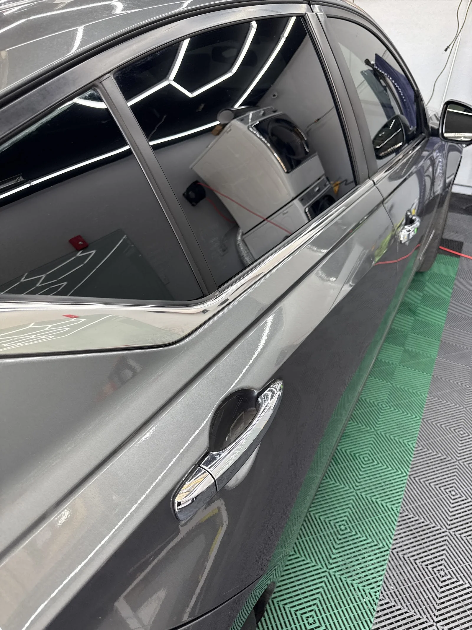 Inside Tint Broz — shop interior and work bay